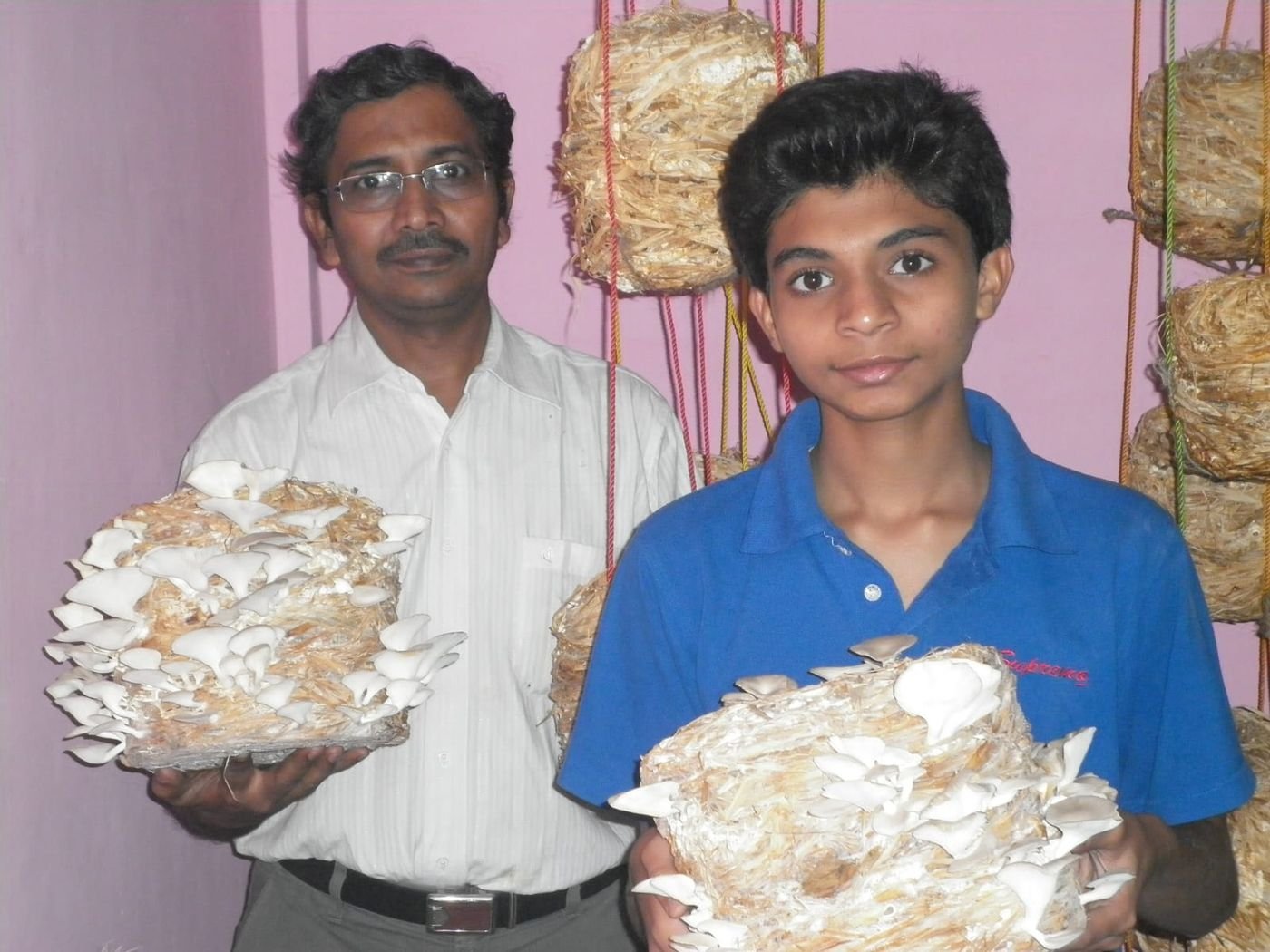 A trainee family with their home harvest