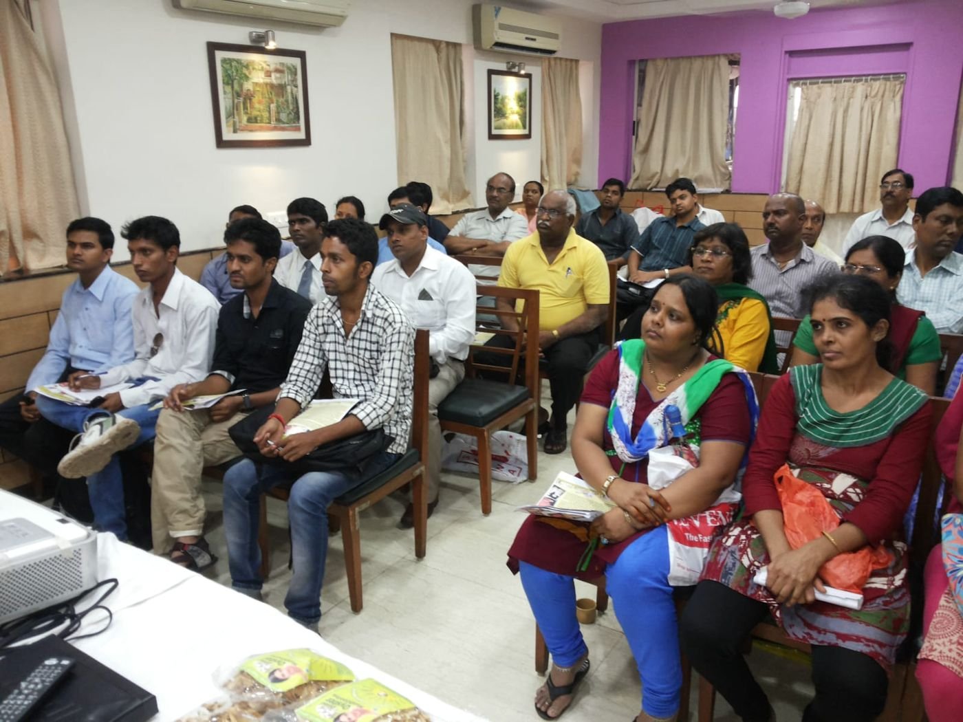 Trainees attending a live seminar session